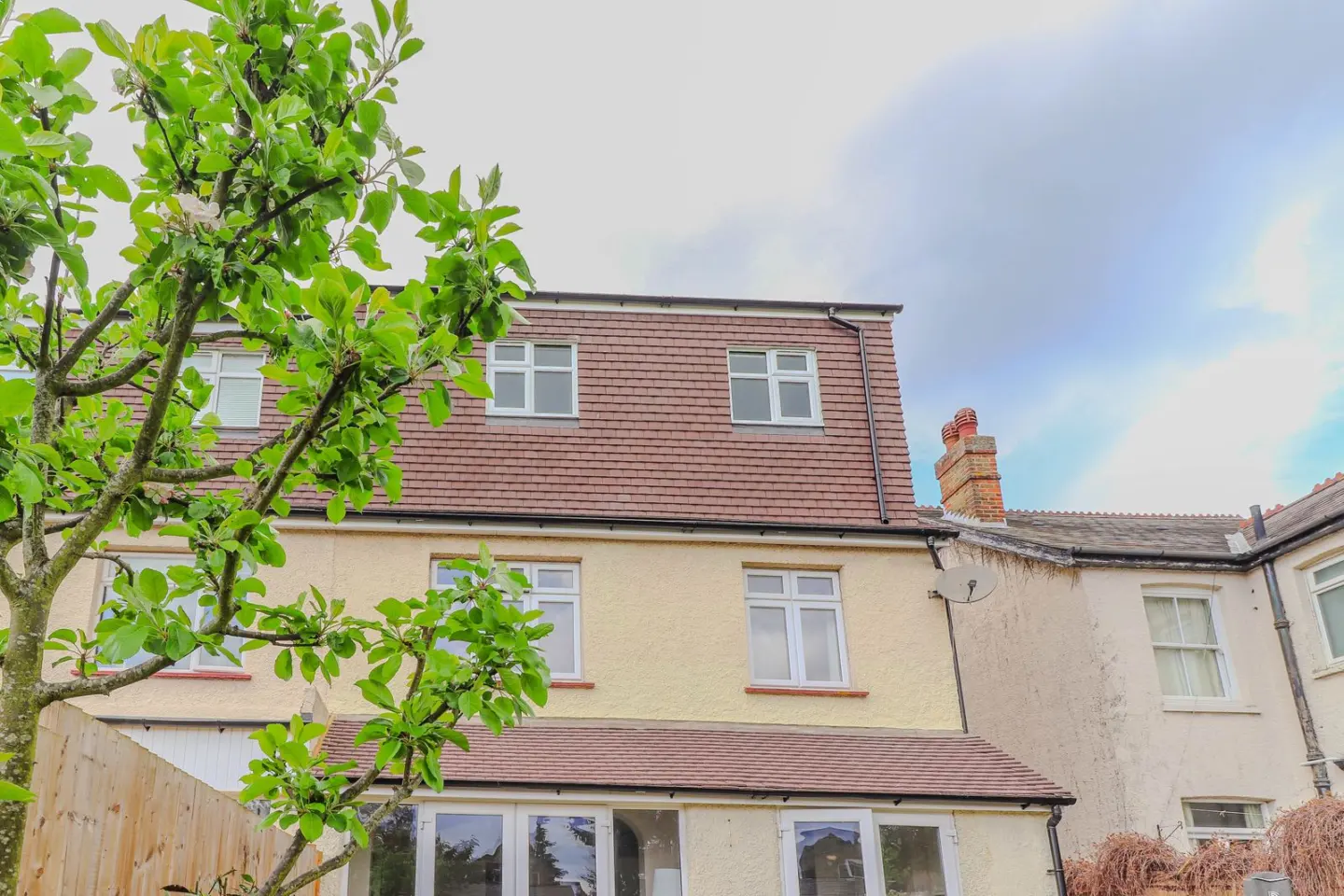 Loft conversions on attached houses usually involve work to the party wall. Albert Road, Ashford