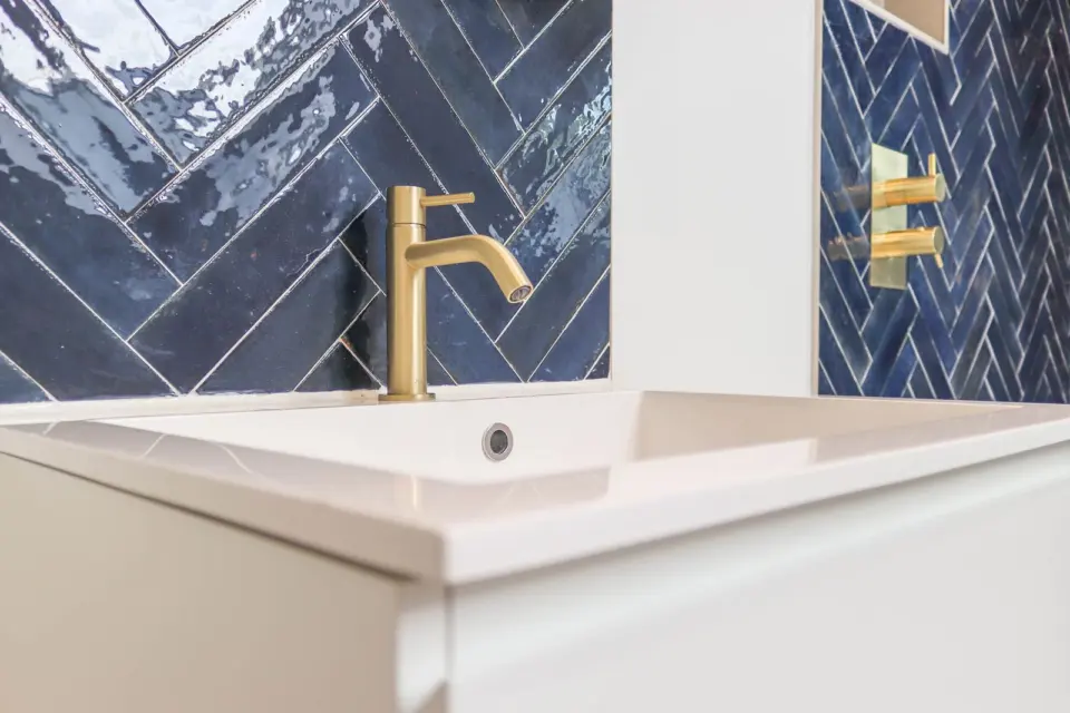 Vanity basin with brass tap at Albert Road, Ashford TW15, a Surrey Build Group project