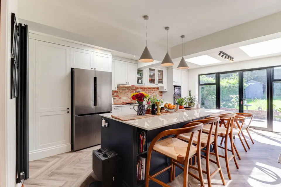 Kitchen with breakfast bar at Ashenden, Guildford GU2, a Surrey Build Group project
