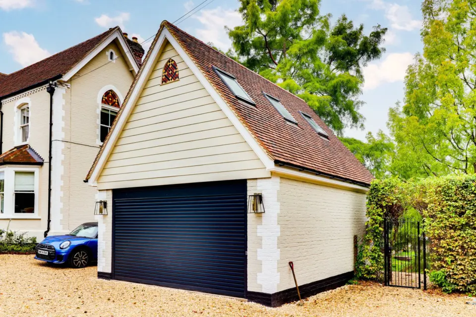 Garage with room above at Mead House, Bramley GU5, a Surrey Build Group project