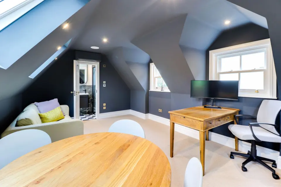 Room above the garage with study area at Mead House, Bramley GU5, a Surrey Build Group project