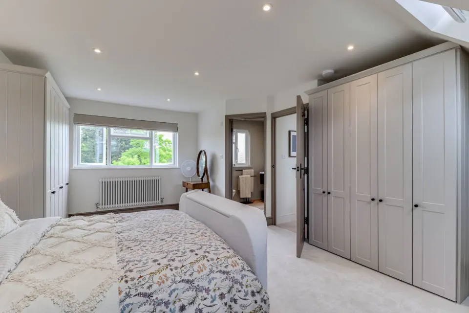 Fitted wardrobes in the eaves at Raeburn, Surbiton KT5, a Surrey Build Group project