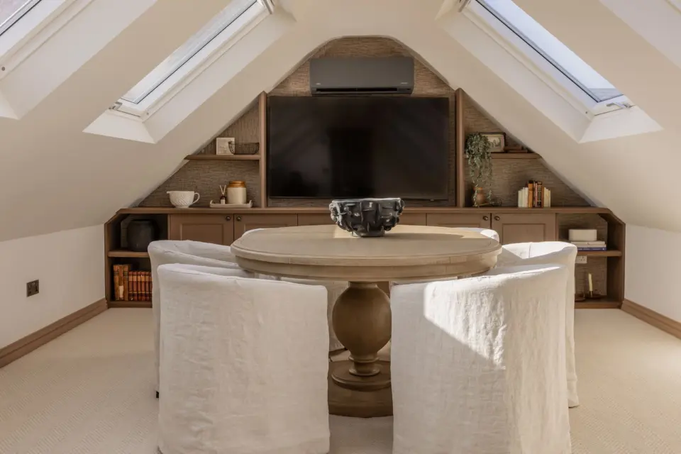 Loft room with fitted media wall at The Bakehouse, Shalford GU4, a Surrey Build Group project