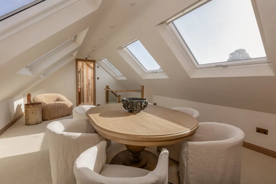 Loft room beneath roof windows at The Bakehouse, Shalford GU4, a Surrey Build Group project