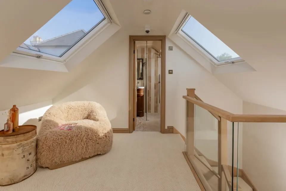 Landing with glass balustrade at The Bakehouse, Shalford GU4, a Surrey Build Group project