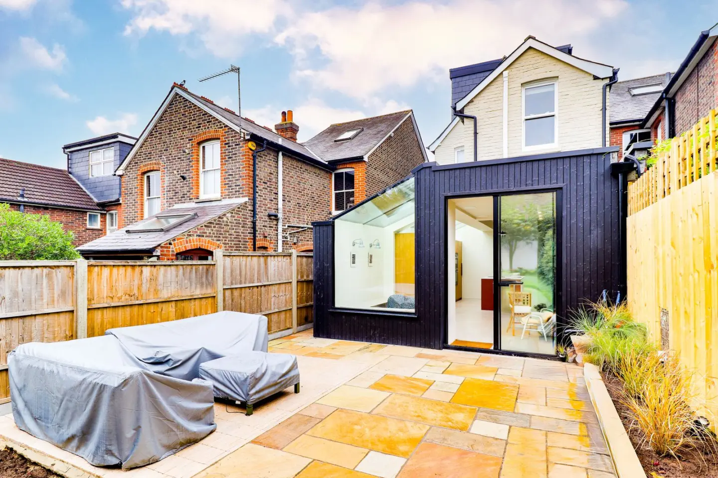 A rear extension and new patio at The Mount, Guildford