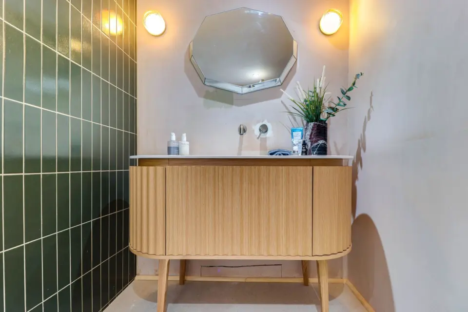 Fluted oak vanity unit at The Mount, Guildford GU2, a Surrey Build Group project