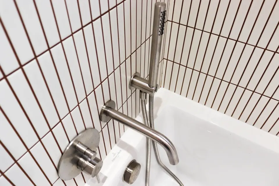 Brushed steel bath fittings at The Mount, Guildford GU2, a Surrey Build Group project